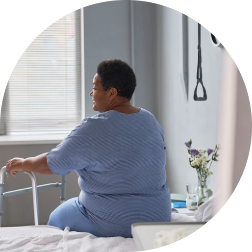Patient holding a walker