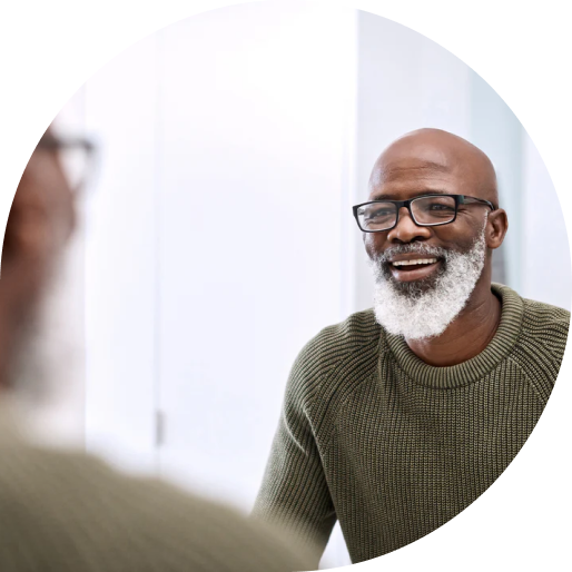 Senior man smiling at the mirror